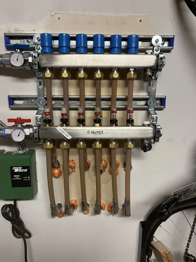 Plumber performing Water Heater Repair at a residential property in Barrett